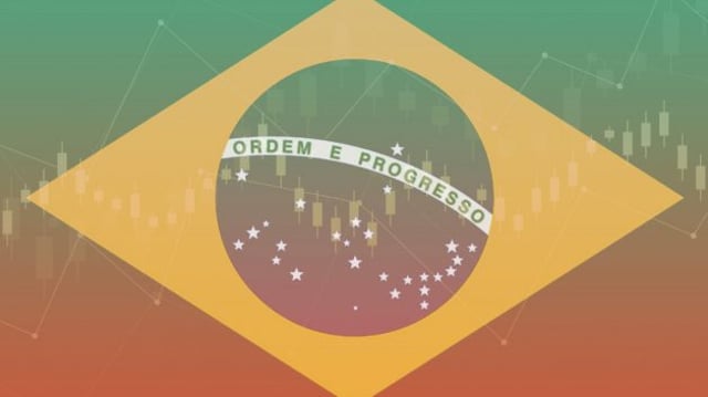 Bandeira do Brasil com gráficos de bolsa ao fundo