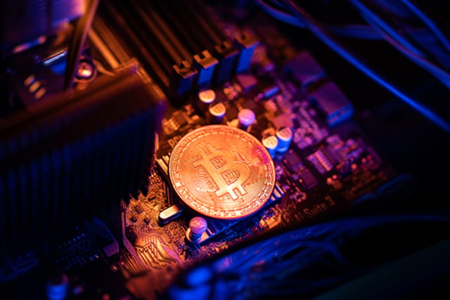 Bitcoin,Cryptocurrency,Coin,On,A,Pc,Computer,Motherboard,,Crypto,Currency