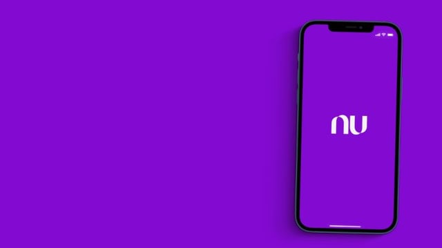 Nubank,App,On,The,Smartphone,Screen,On,Purple,Background.,Brazilian