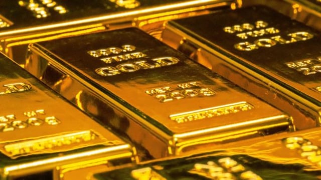 Foto mostrando barras de ouro; a Aura (AURA33) é uma mineradora focada nessa commodity