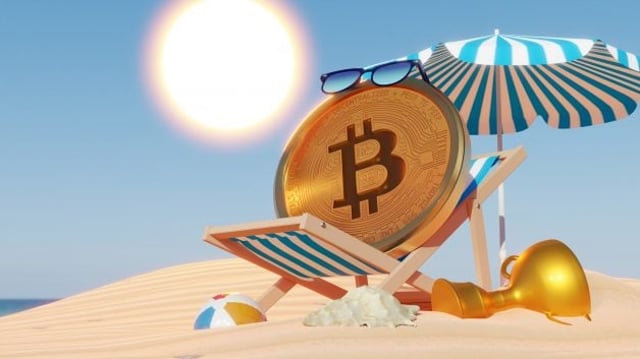 Bitcoin sentado em uma cadeira de praia