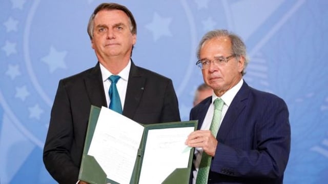 O presidente Jair Bolsonaro e o ministro Paulo Guedes, na cerimônia de lançamento do novo marco de securitização
