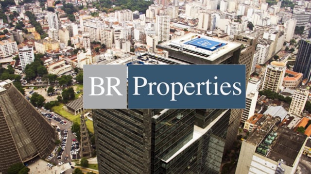 Vista aérea de um prédio com o logo da BR Properties (BRPR3) sobreposto à imagem | Dividendos