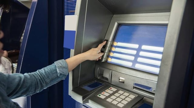 people-waiting-get-money-from-automated-teller-machine-people-withdrawn-money-from-atm-concept (1)