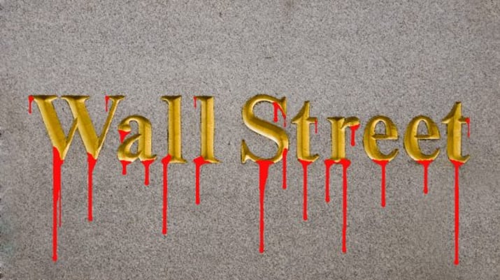 Tinta vermelha simula sangue na palavra Wall Street