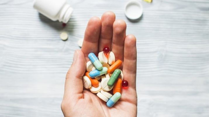 Colorful,Pills,And,Medicines,In,The,Hand