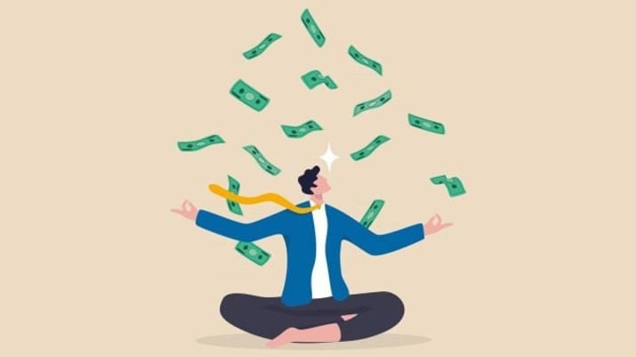 pessoa meditando dinheiro yoga