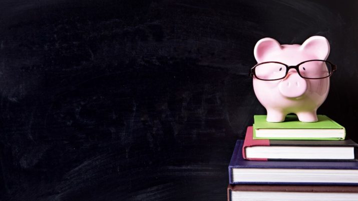 Piggy bank with glasses and blackboard