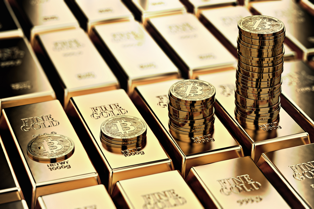 criptomoedas empilhadas sobre barras de ouro
