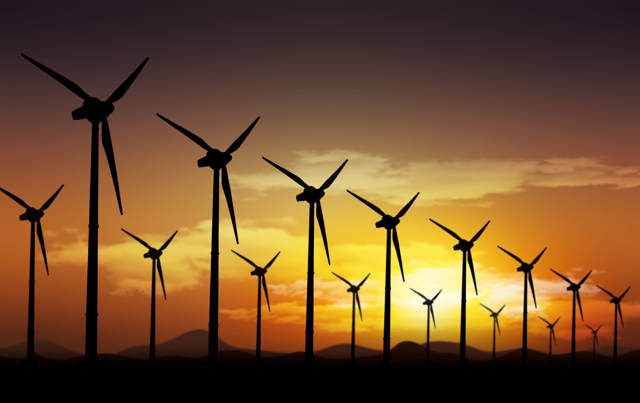 Turbinas de energia eólica no por do sol | Omega MEGA3