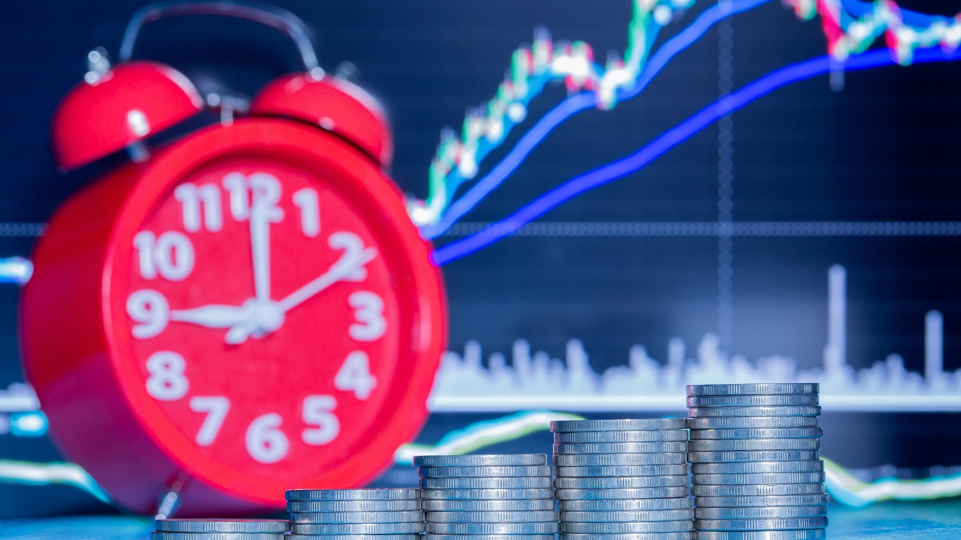 Relógio com gráfico de cotações da bolsa e moedas; B3