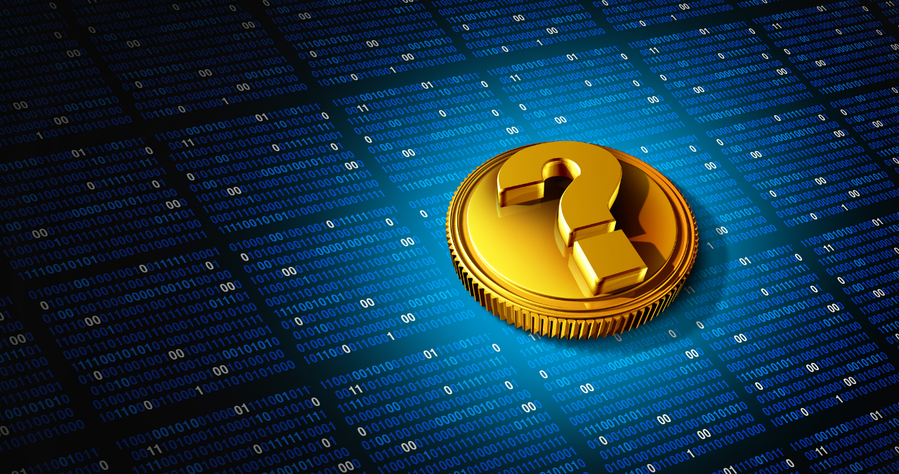 Criptomoeda com um ponto de interrogação em cima, sob um fundo azul