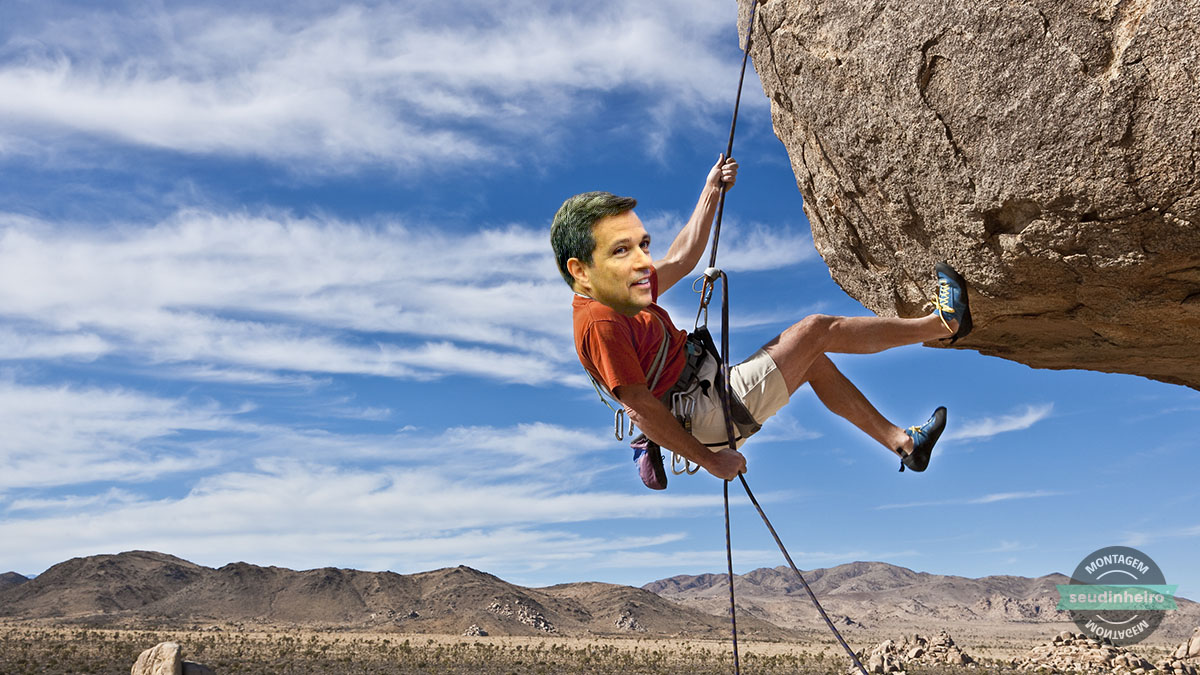 Campos neto escalando montanha