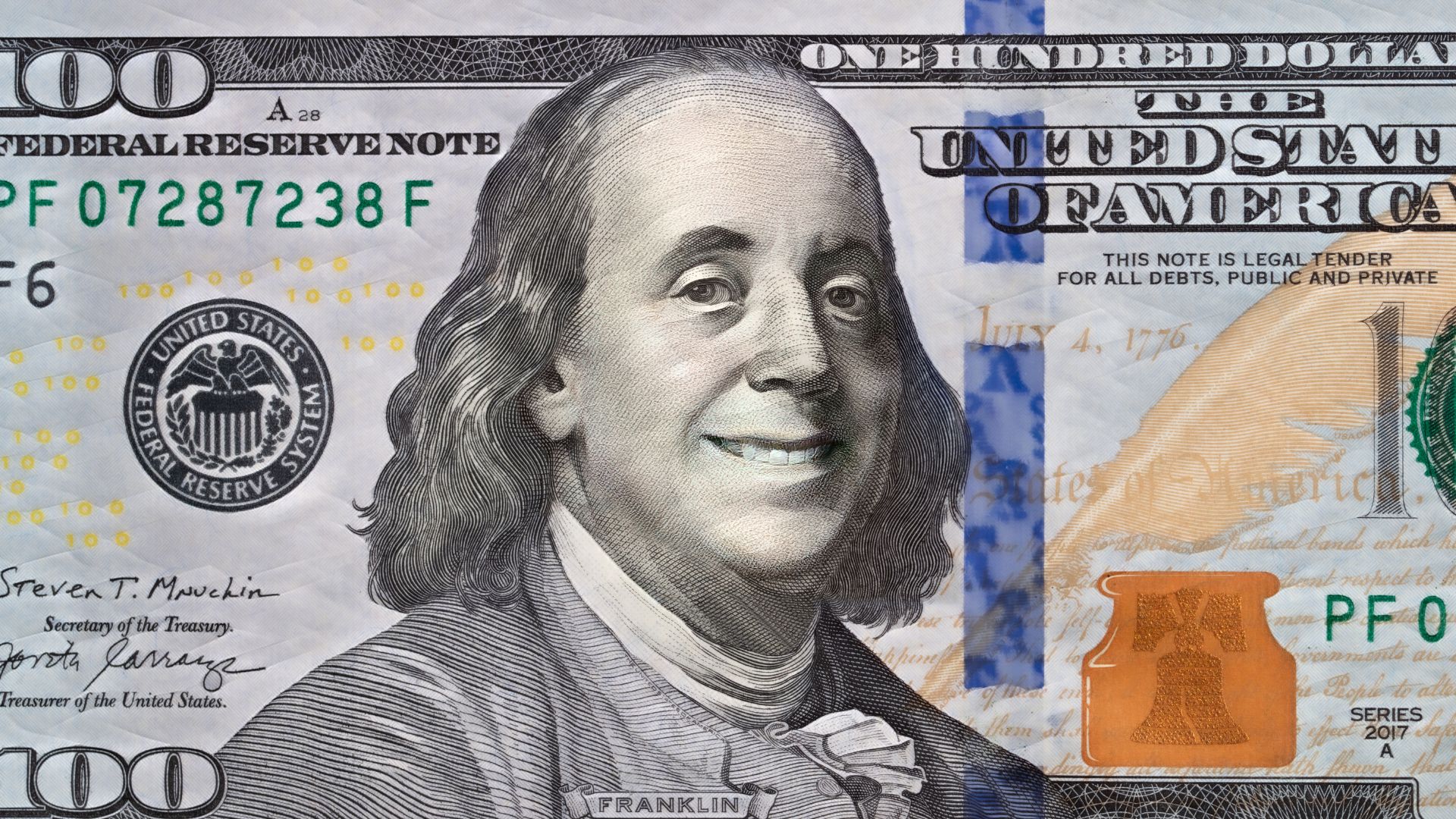 Imagem de uma nota de dólar sorrindo
