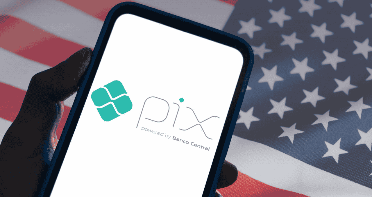 Imagem mostra um celular com o símbolo do Pix e no plano de fundo a bandeira dos Estados Unidos